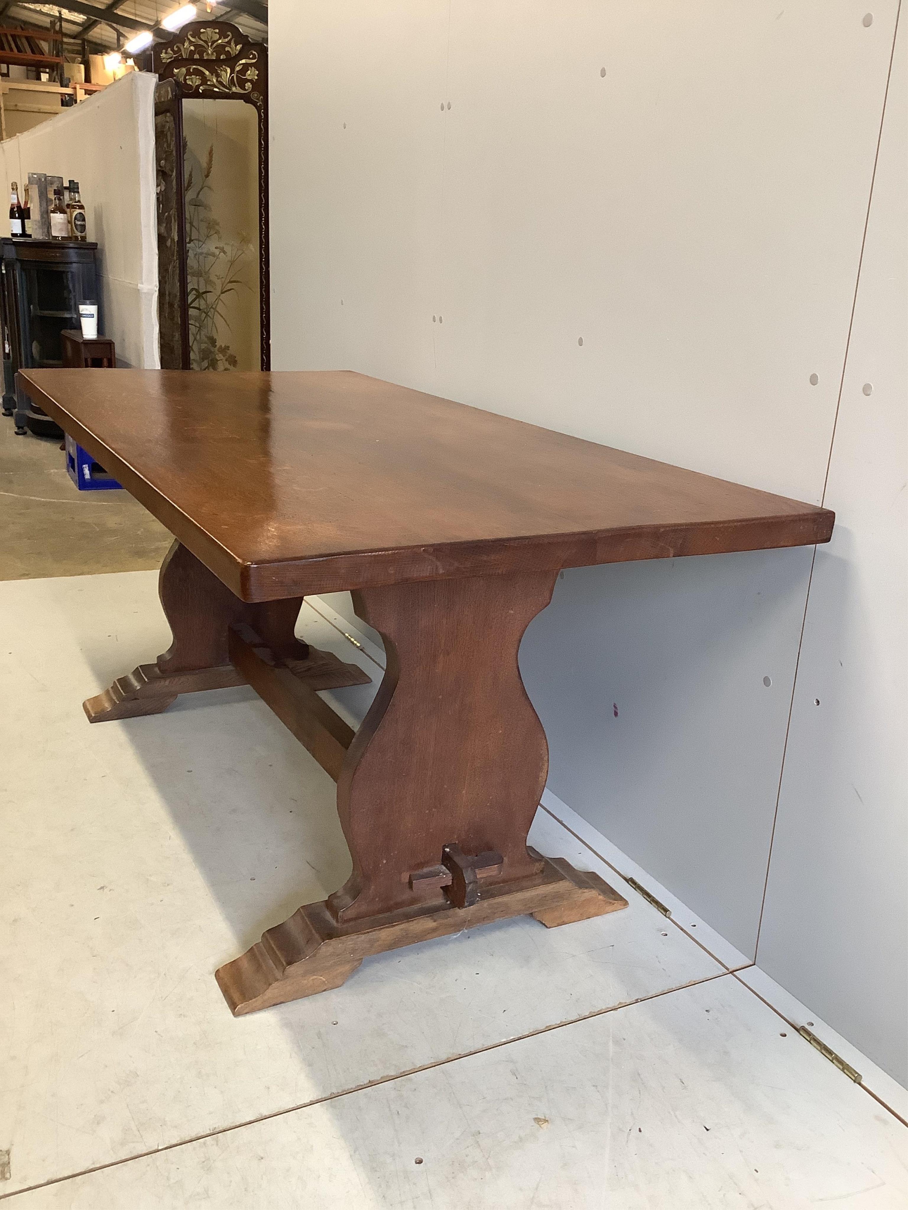 A 17th century style rectangular topped oak refectory table, width 168cm, depth 79cm, height 74cm. Condition - fair